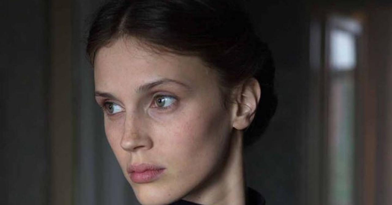 Confession: a beautiful portrait of a corseted woman (review)